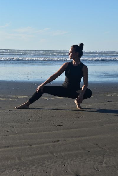 Me on the beach in a low backsquat.